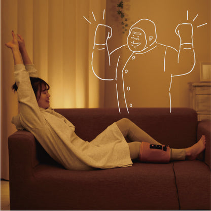 Woman on sofa using Gorilla Grip Calf Compression Massager with white Gorilla drawing background