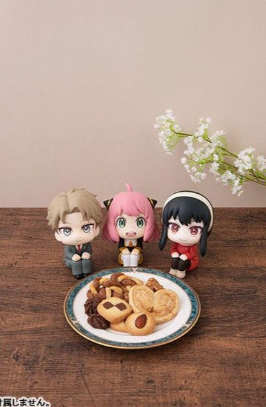 Lookup series Anime Figure SPY X FAMILY Loid Forger Anya Forger Yor Forger figures sitting in front of plate of cookies